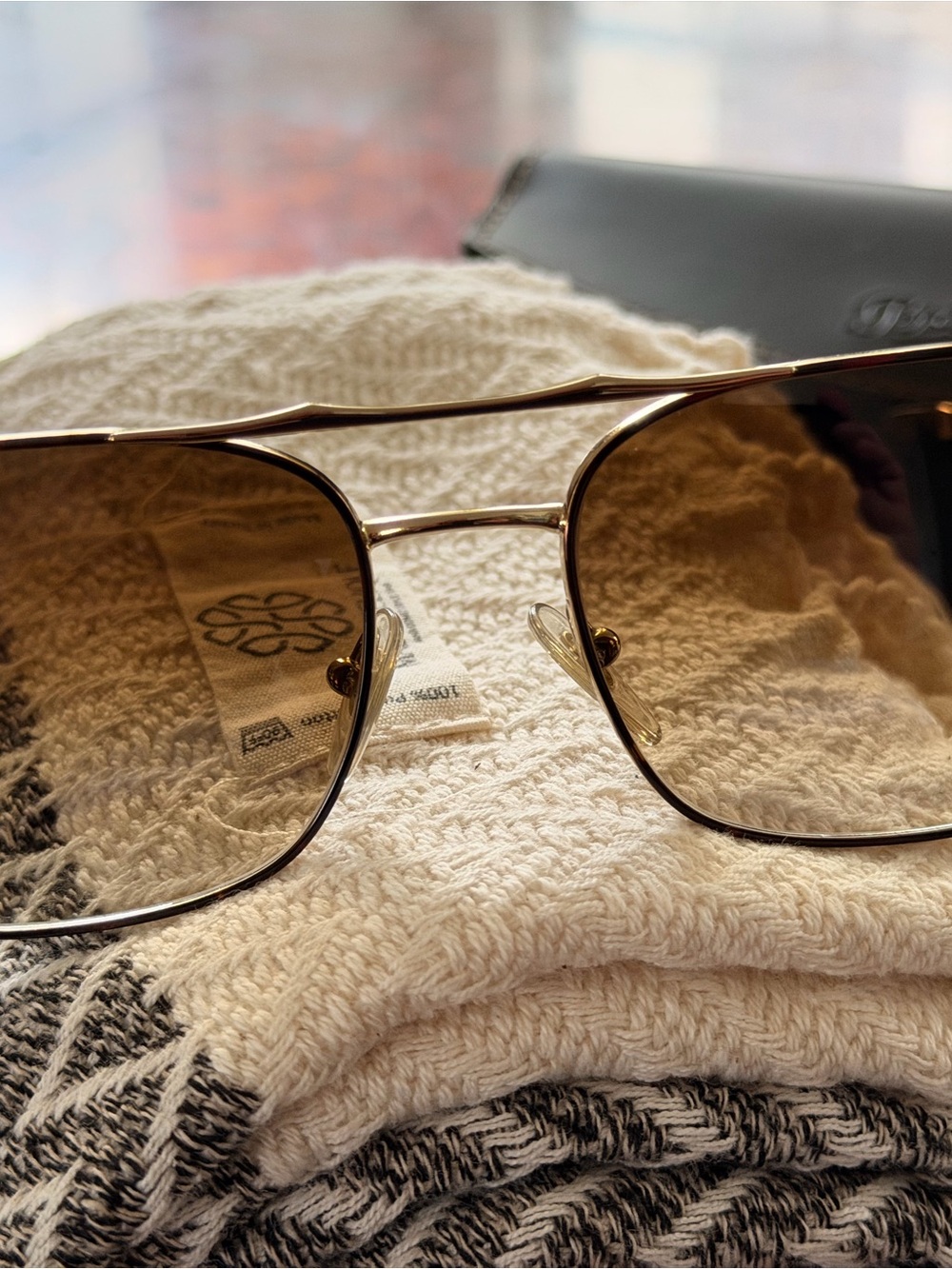 Persol Gold Metal Frame Sunglasses with Brown Gradient Lenses.